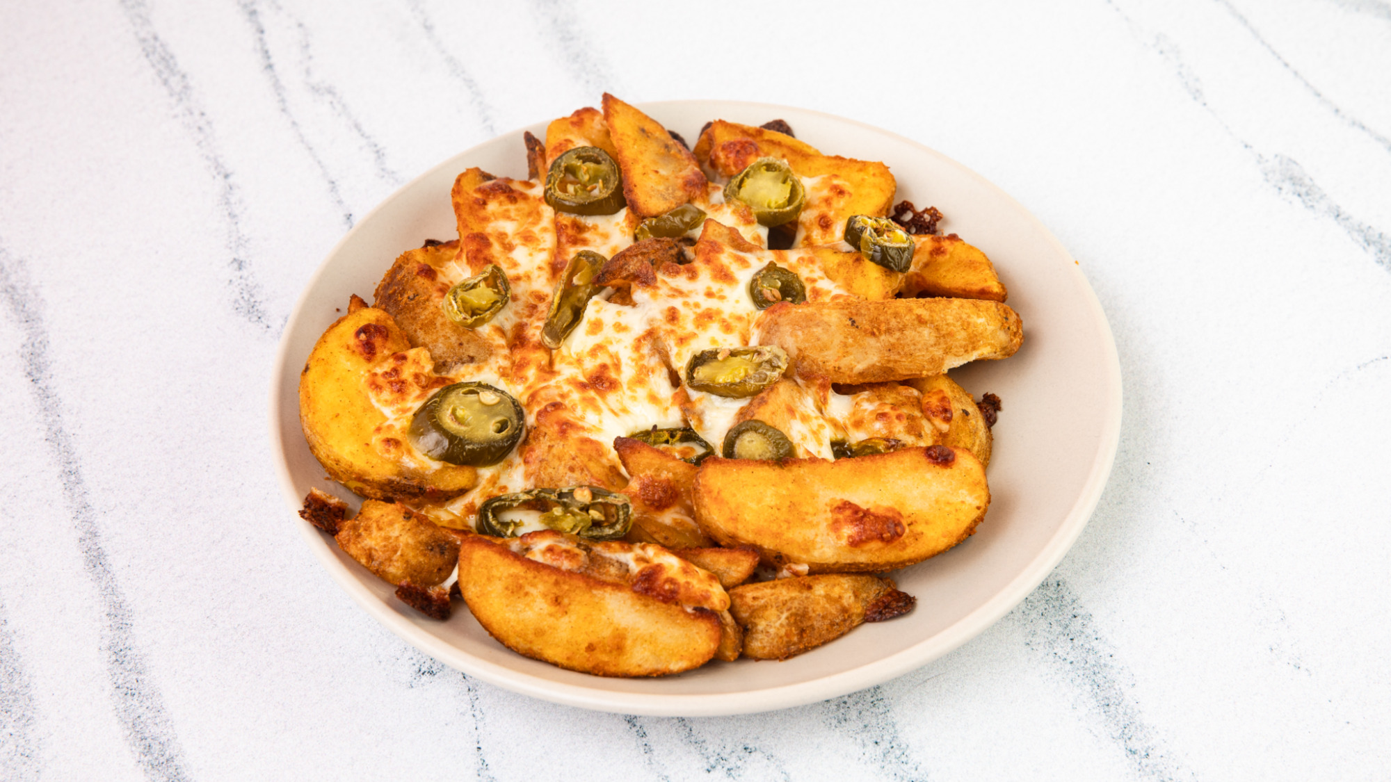 Loaded Wedges with Jalapenos 🍃 - Number One Delivery in North Stifford RM16